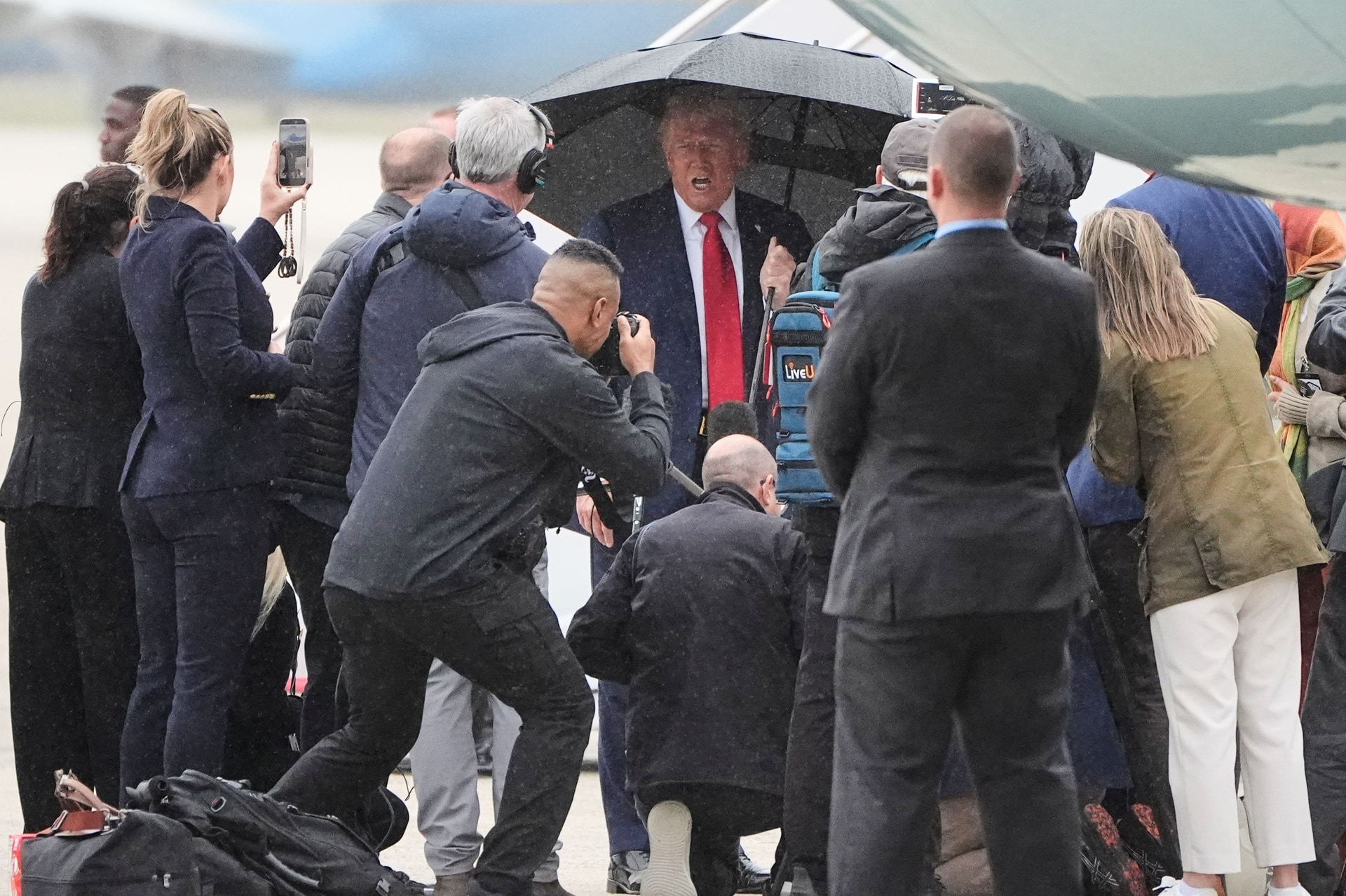 President Donald Trump speaks with reporters before boarding Air Force One at Joint Base Andrews, Maryland., as he heads to the Middle East (Mark Schiefelbein/AP).