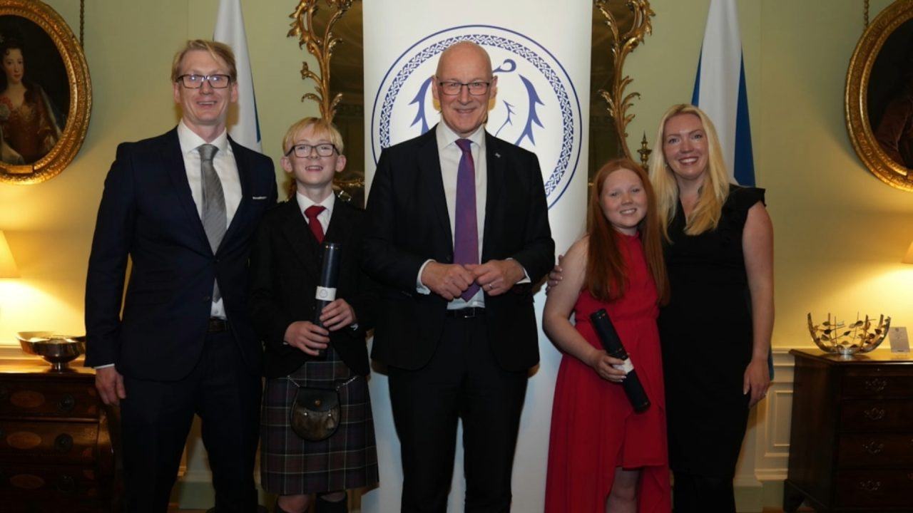Brother and sister who saved mum’s life after cardiac arrest recognised by First Minister for their bravery