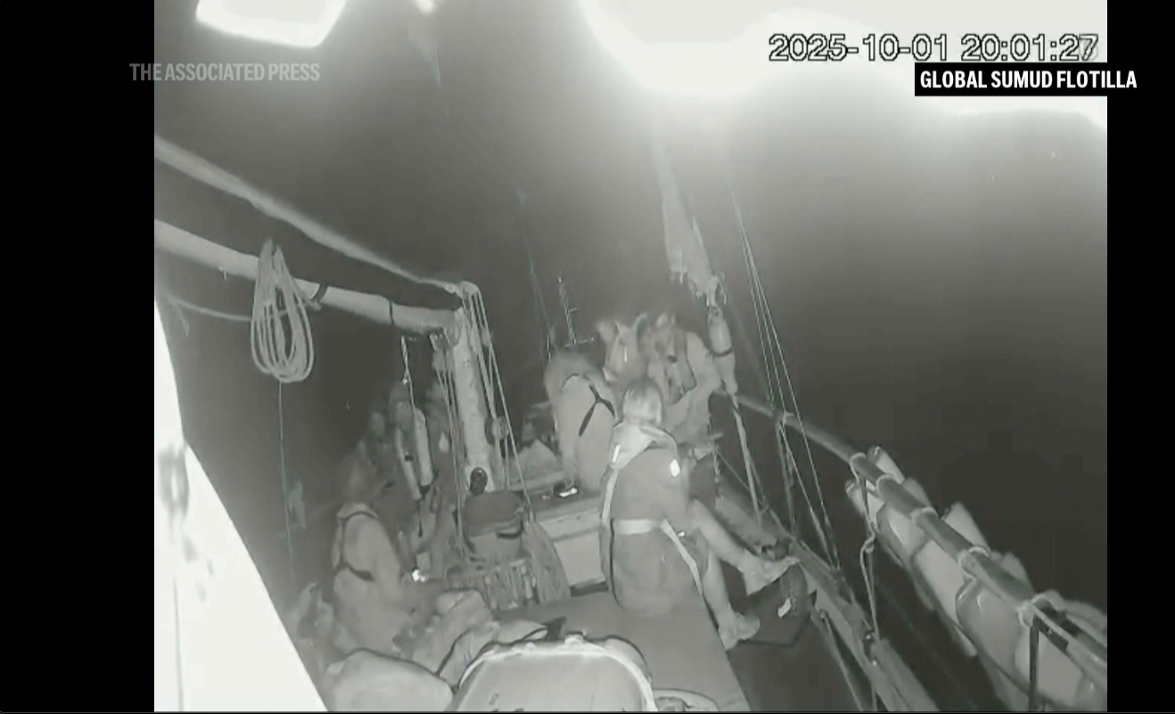 Activists on board a flotilla of vessels sailing towards Gaza say the Israeli navy has begun intercepting their vessels as they approach the besieged Palestinian territory.