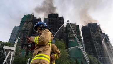 Firefighters continue to tackle deadly Hong Kong tower blaze
