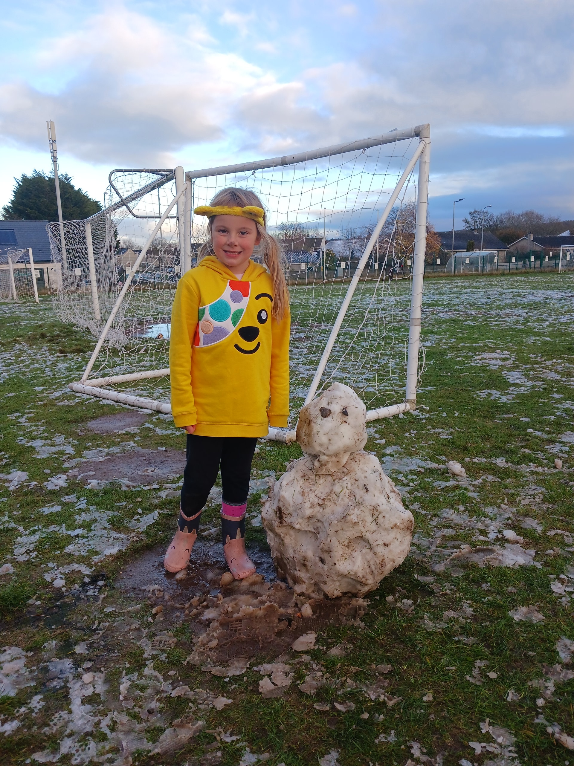 Six-year-old Sophie Robertson ready for Children in Need day after building a snowman in Inverness.