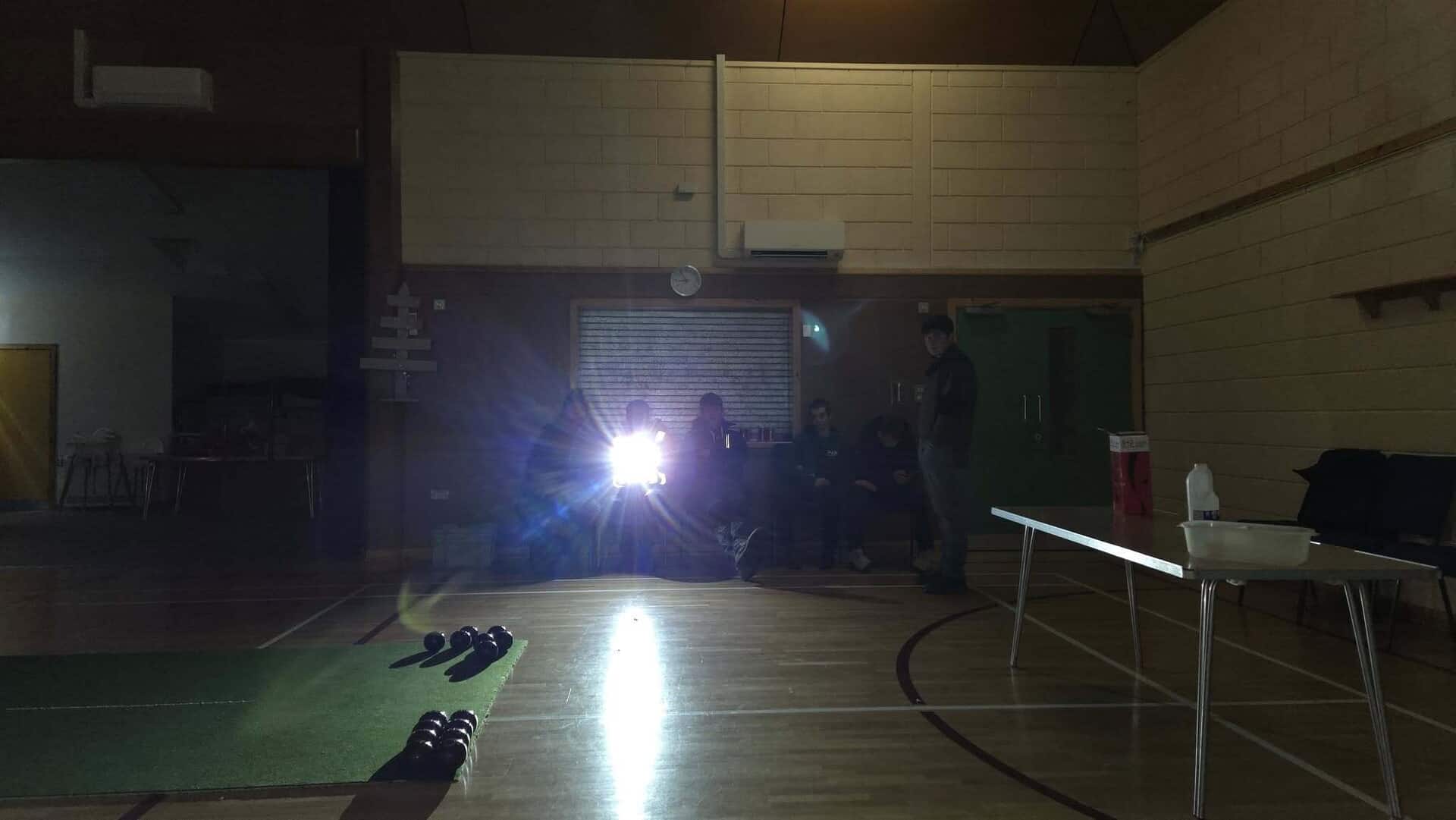 East Mainland Young farmers play bowls in the dark, during a power cut on November 19, 2025.