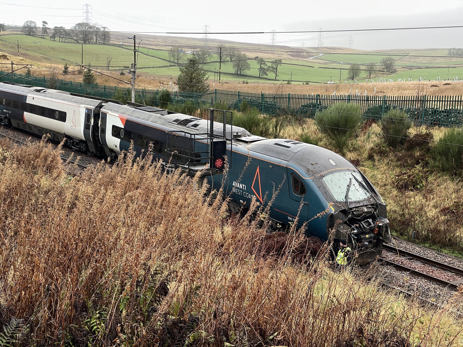 Train from Glasgow to London derails after hitting landslide