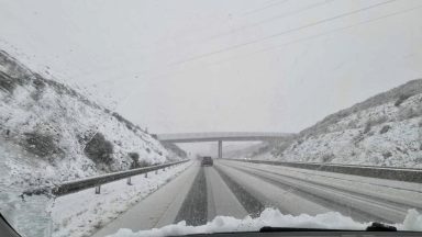 Dozens of schools closed and lorry jacknifed as ice and snow grip Scotland