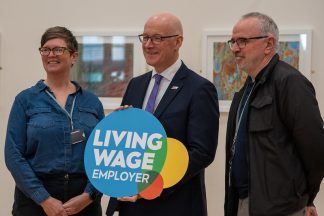 Record number of Scottish businesses paying real living wage, Swinney says