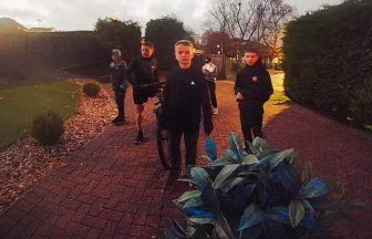 Boys spread festive cheer with doorstep rendition of Last Christmas
