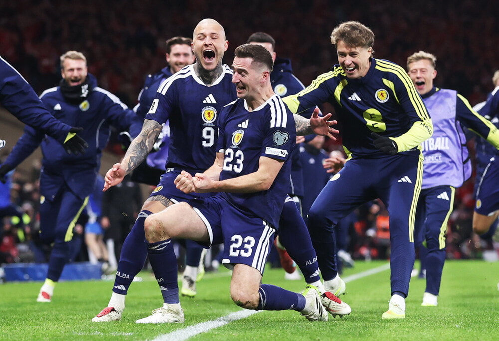 Scotland’s Kenny McLean celebrates after scoring to make it 4-2