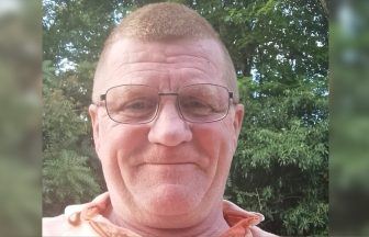 Search for driver who fled after car plunged into River Nairn