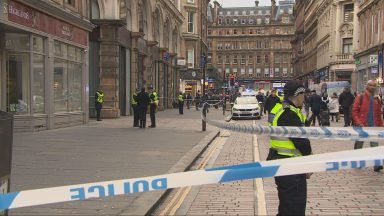 Man taken to hospital and street cordoned off after Glasgow city centre assault