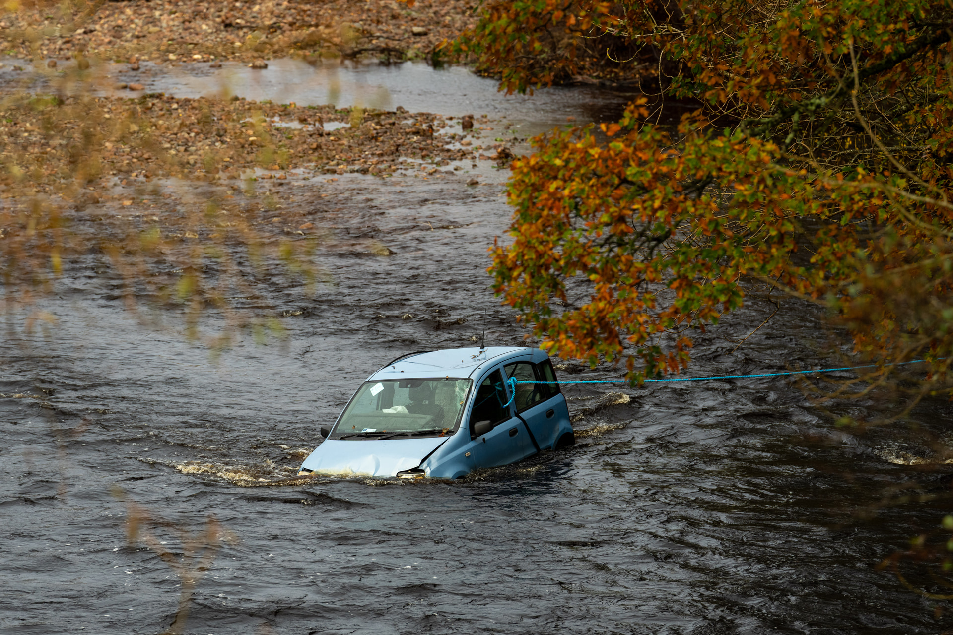 Car in the River Nairn.