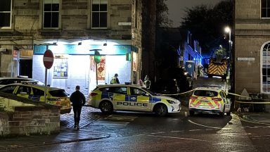 Edinburgh street taped off as four fire engines tackle house blaze