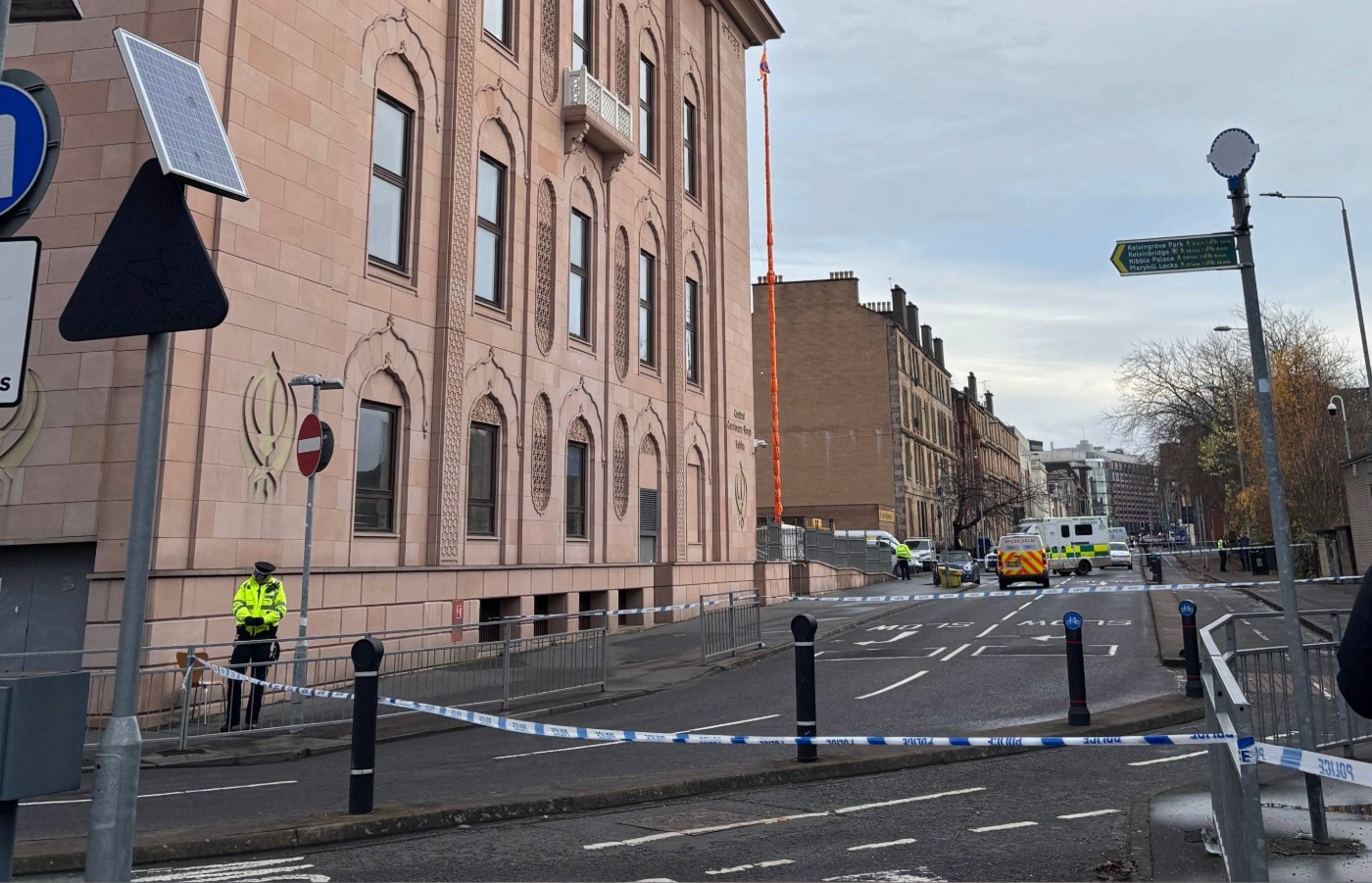 Image for Man dead and three in hospital as police cordon off street after disturbance