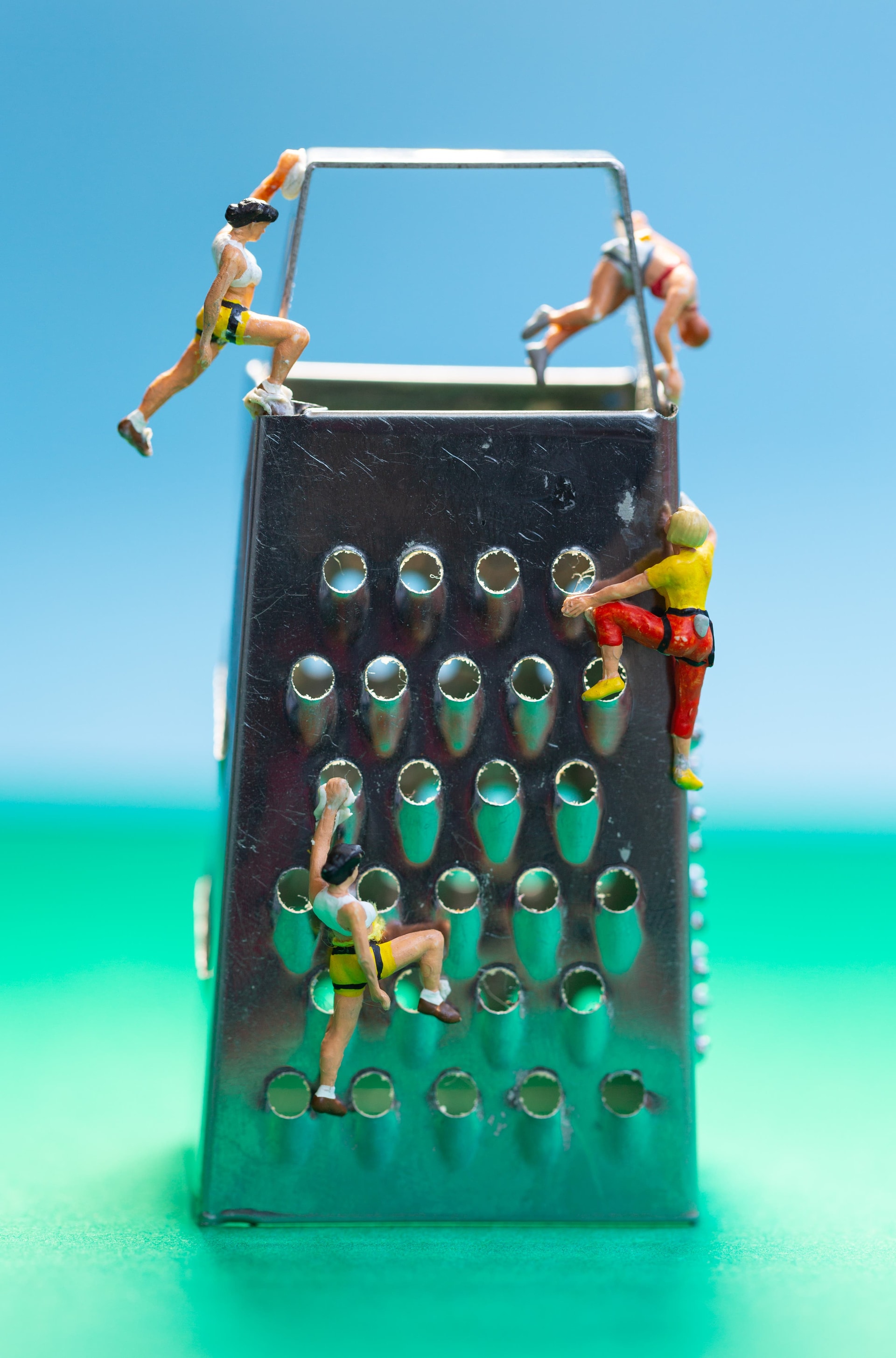 In another image, climbers scale a cheese grater (Gordonstoun/PA)