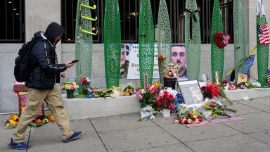 National Guard member shot in attack has shown positive signs, governor says