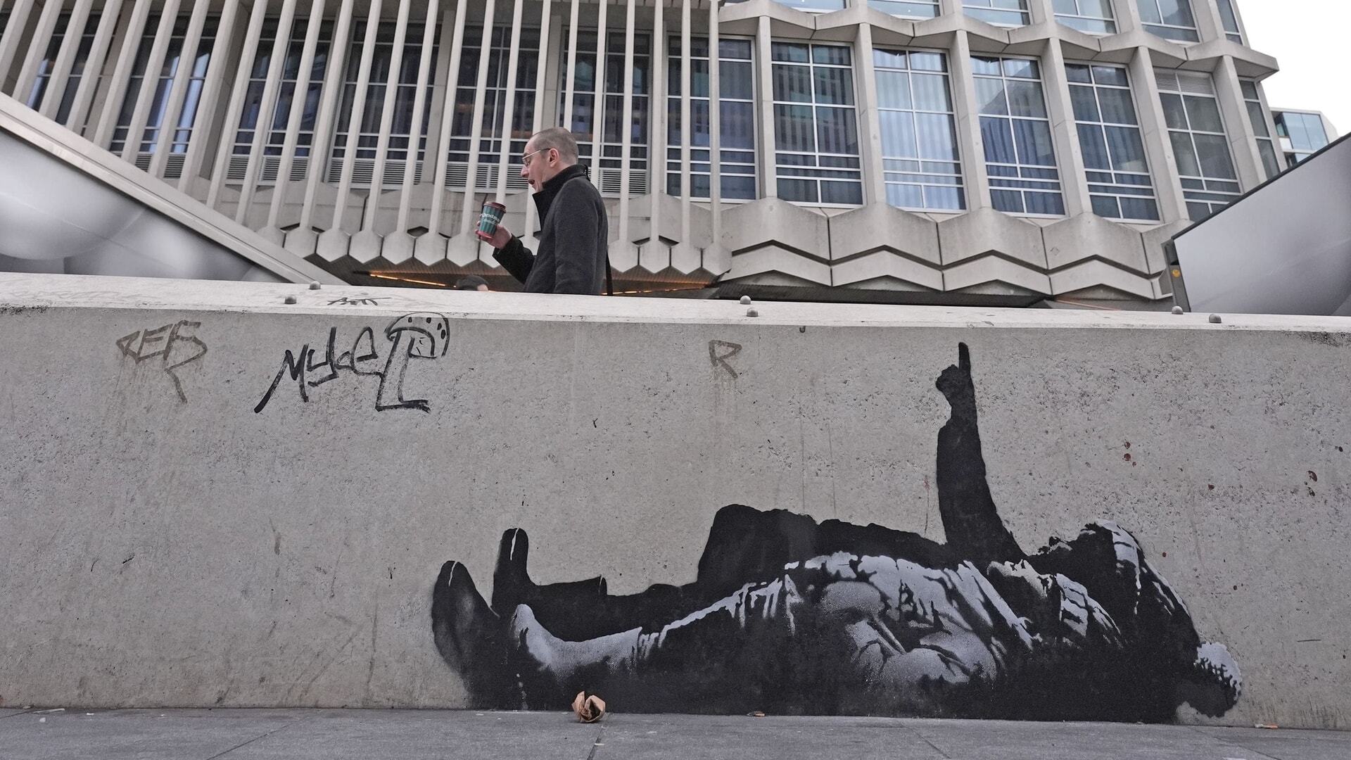 Graffiti beneath the Centre Point building near Tottenham Court Road in central London.