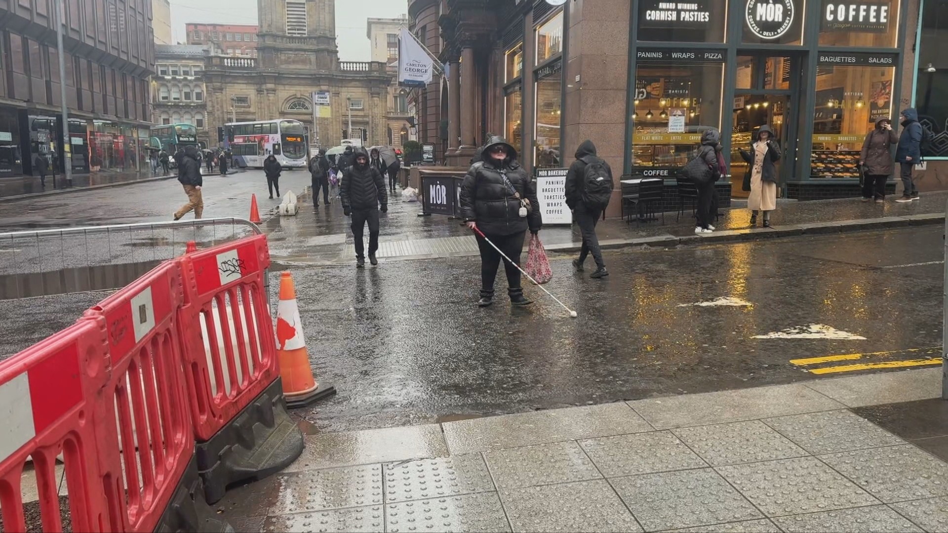 Siobhan uses a guide cane to get around