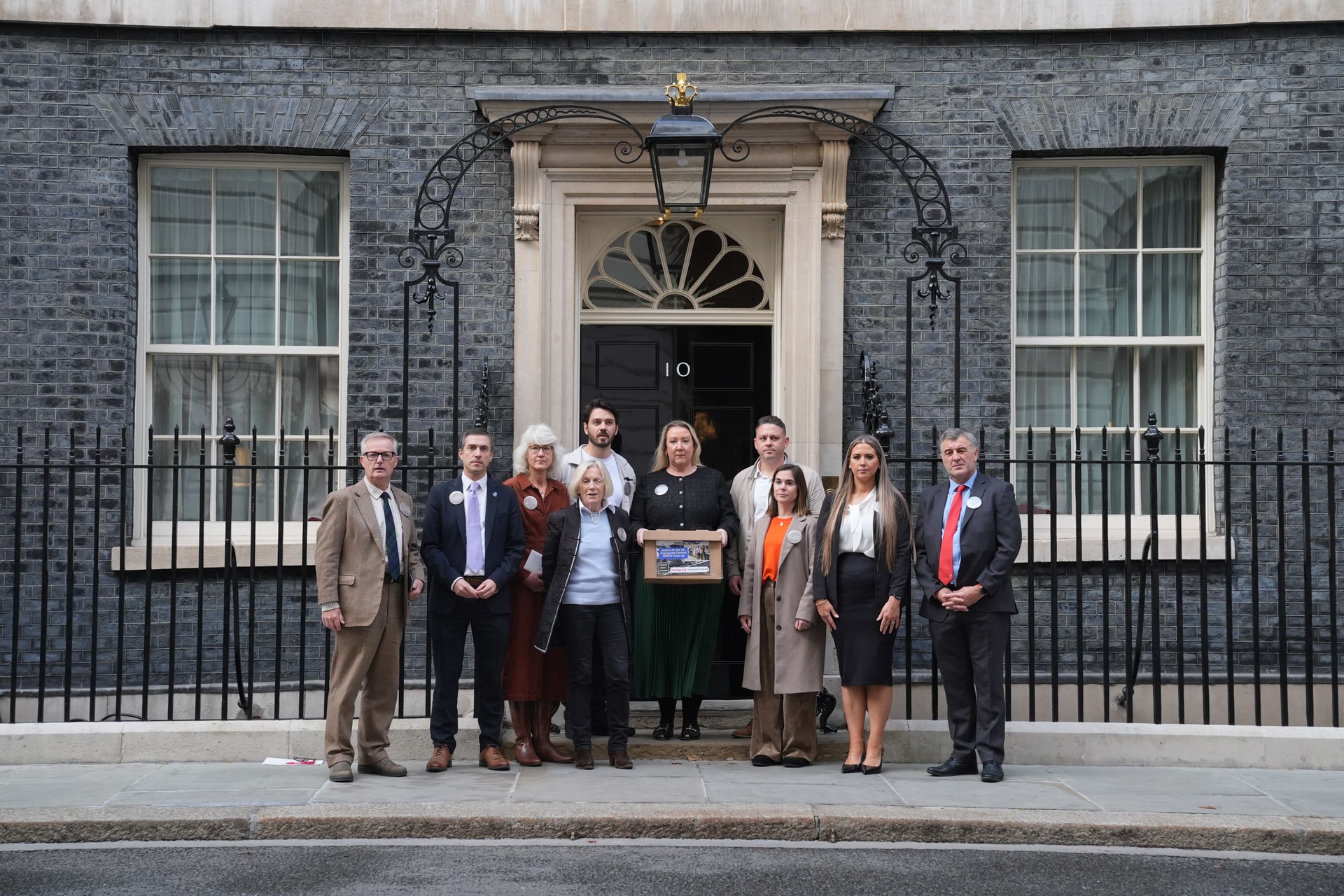 Family members of victims of the 1994 RAF Chinook before handing in a letter to 10 Downing Street in October (Lucy North/PA)