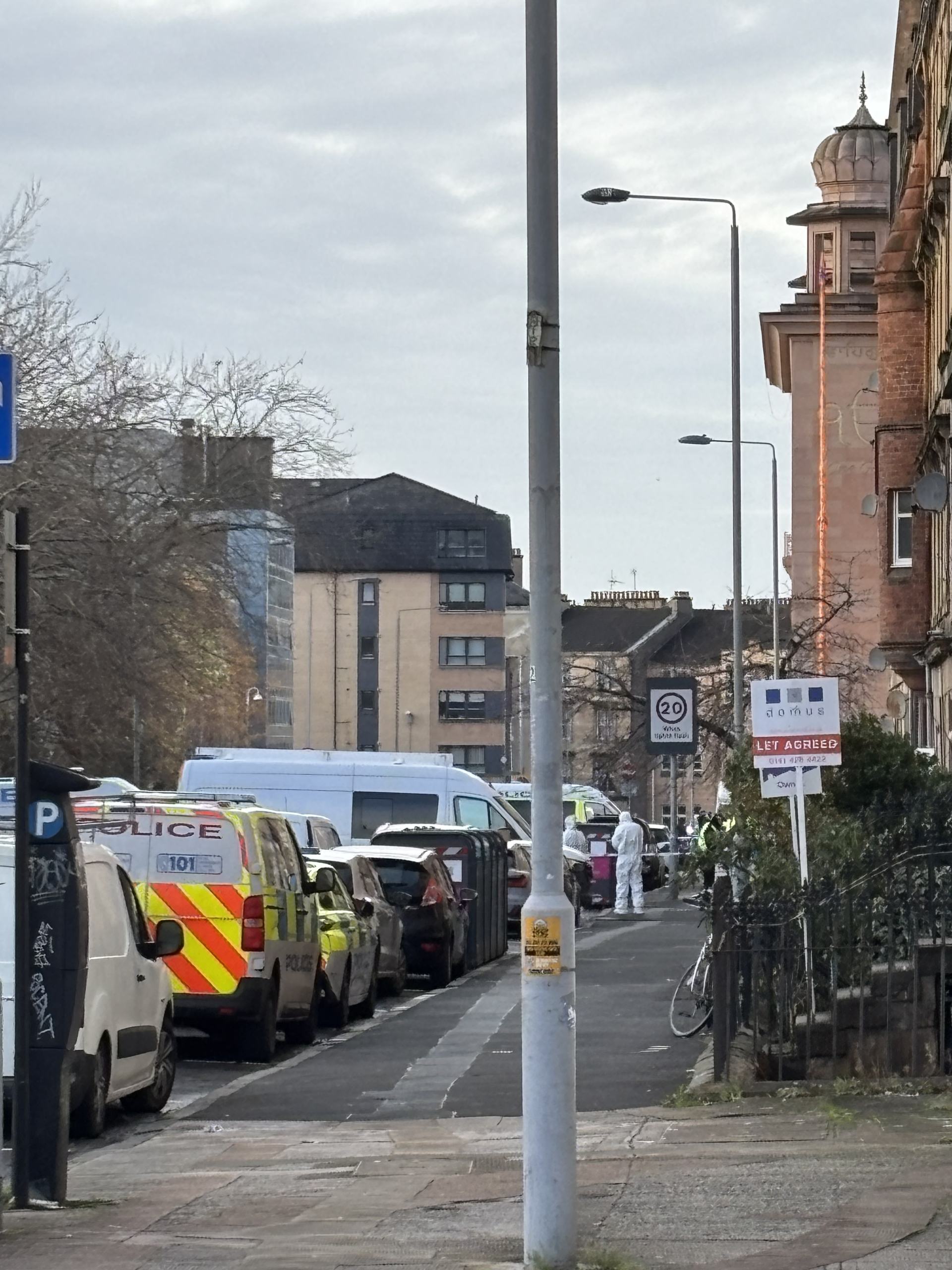 Forensic officers remain on the scene on Berkeley Street