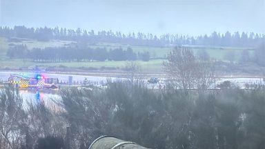 Roads flooded and train speed restricted as heavy rain batters Scotland