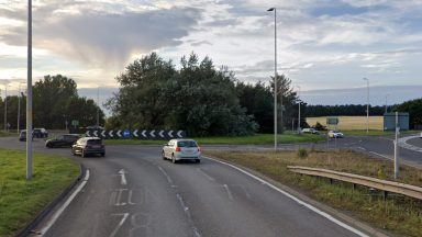 Road near Prestwick Airport closed after crash as drivers warned of debris