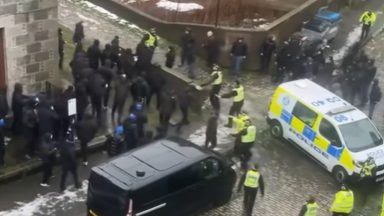 Watch as Aberdeen and Rangers fans clash in huge brawl with police before game