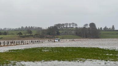 Roads flooded and train speed restricted as heavy rain batters Scotland