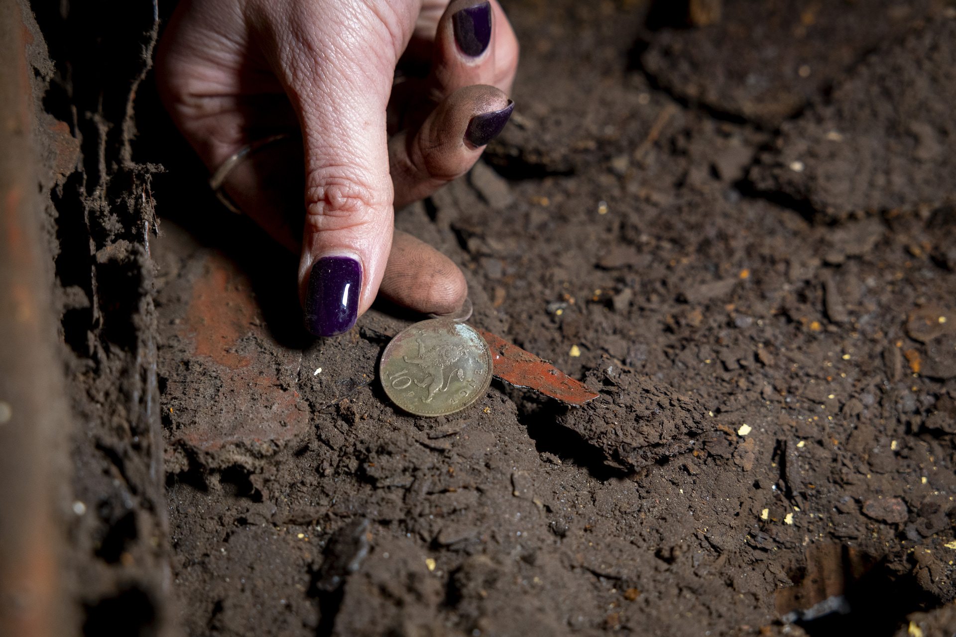 A  10p piece that was thrown in by ten-year-old Tom Gibson during the ceremony in 1998.