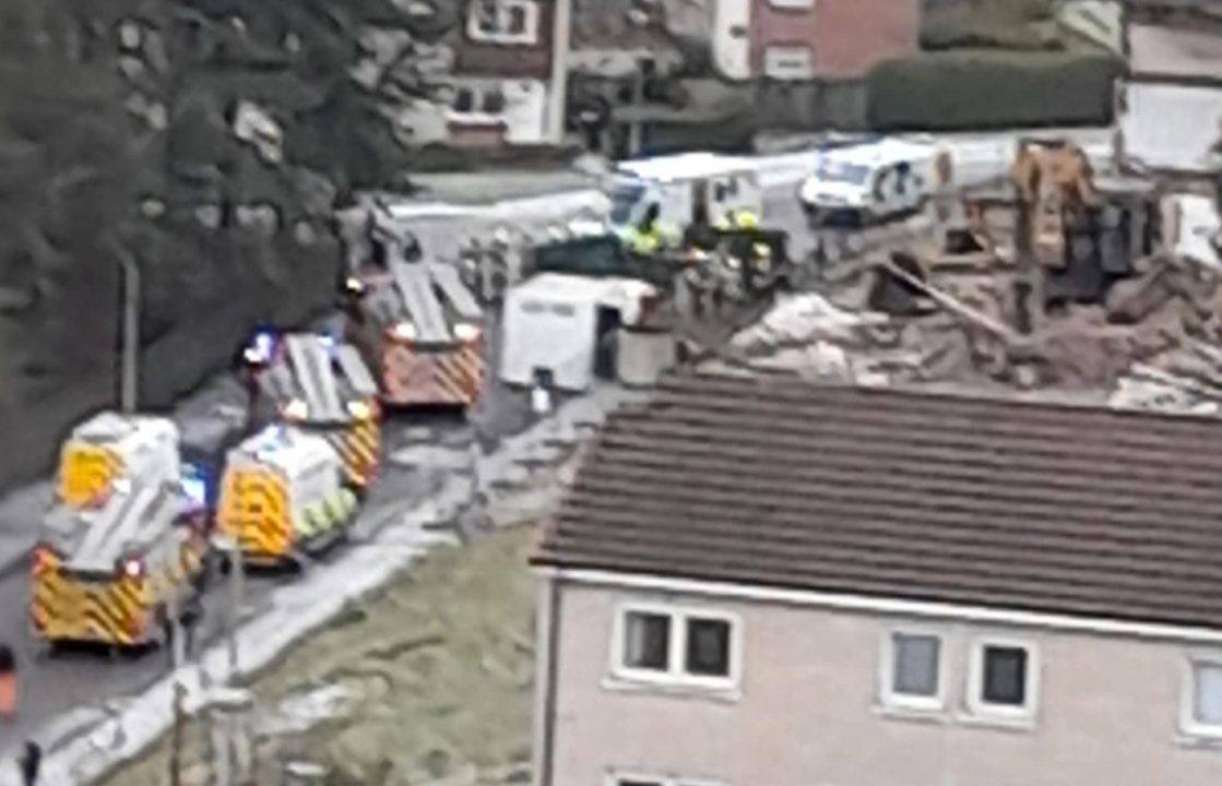 Man taken to hospital and road closed after incident at demolition site in Paisley