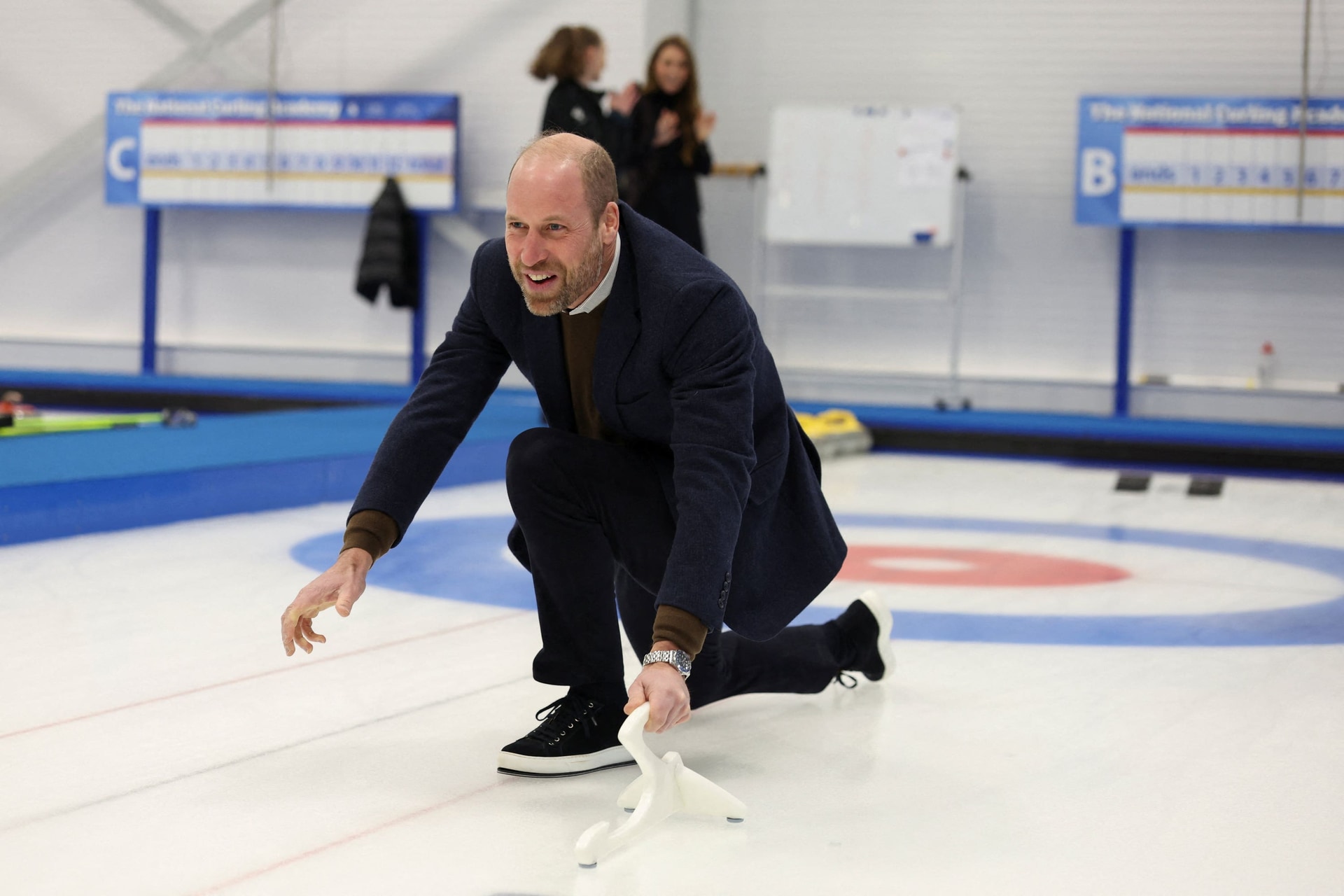William also had a shot at curling during the visit