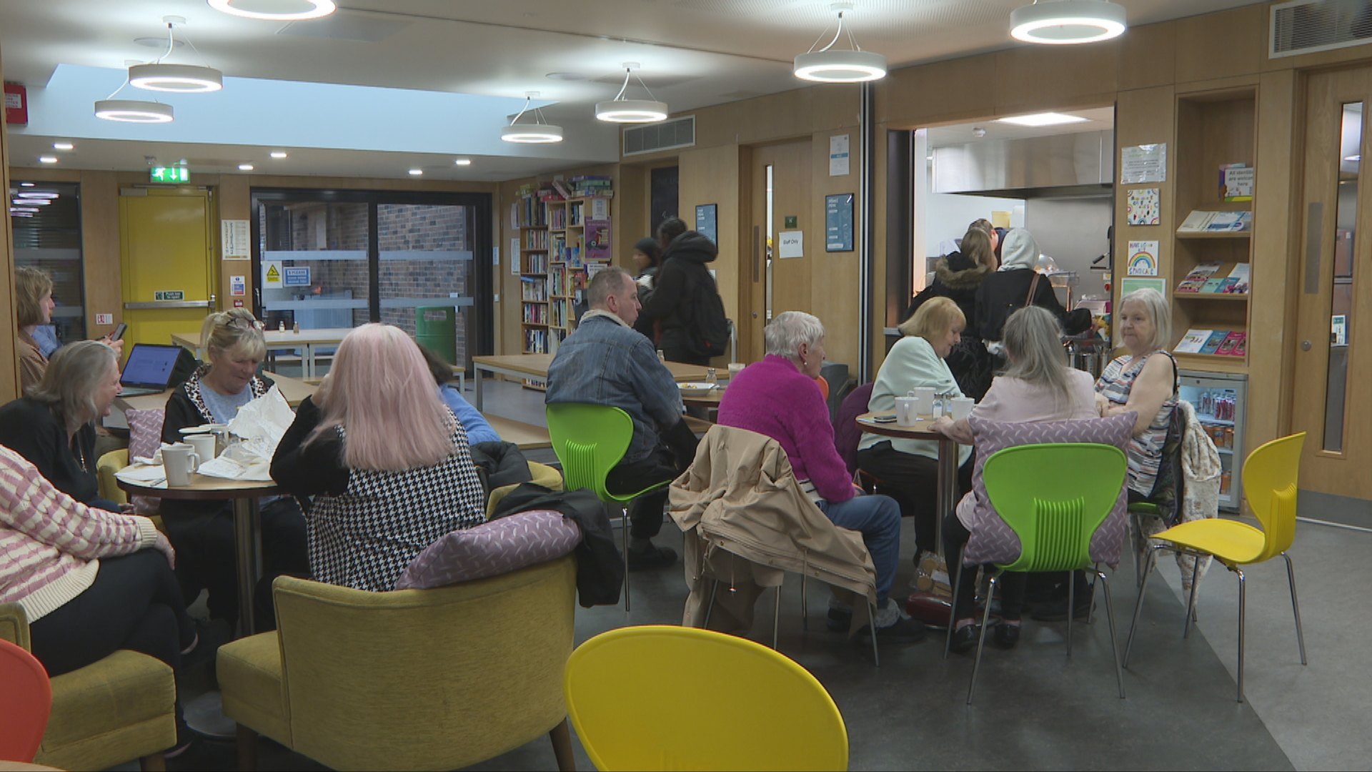 Locals come to the community hub for a hot meal and to take part in activities