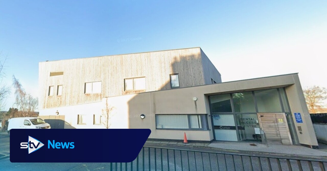 Man taken to hospital after car crashes into dental clinic