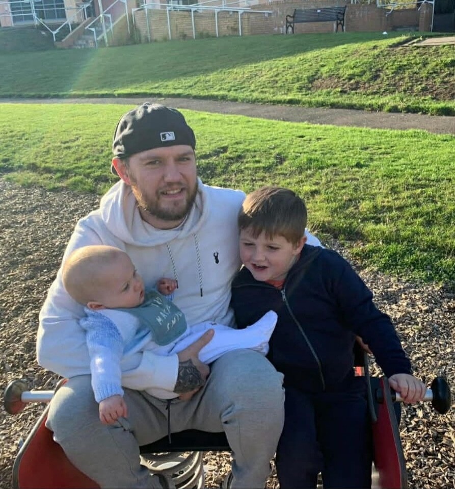 Lyle with his dad Tjay and baby brother