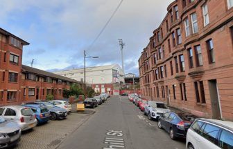 Roads closed after debris falls from damaged roof 