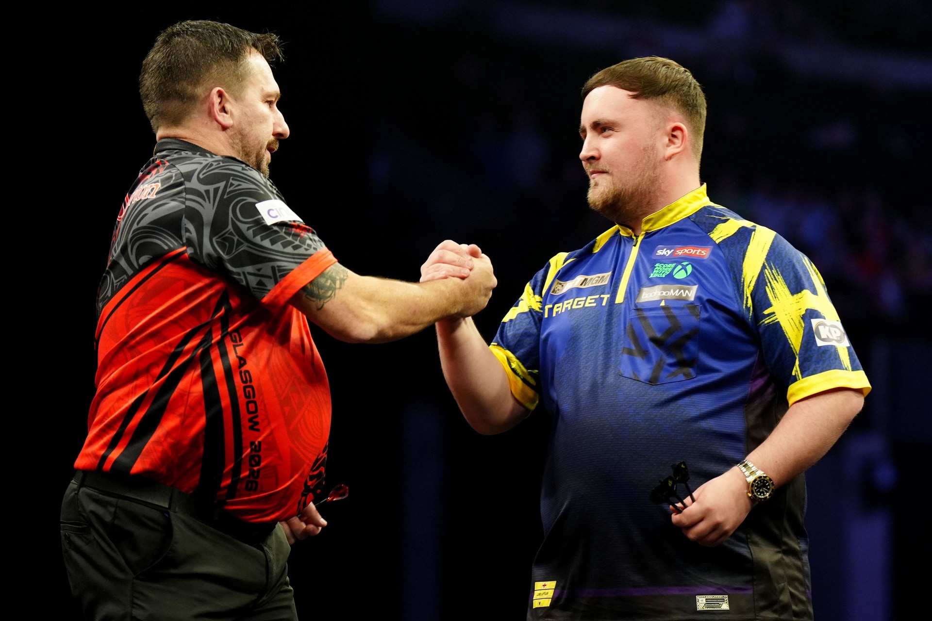 Luke Littler, right, was no match for Clayton