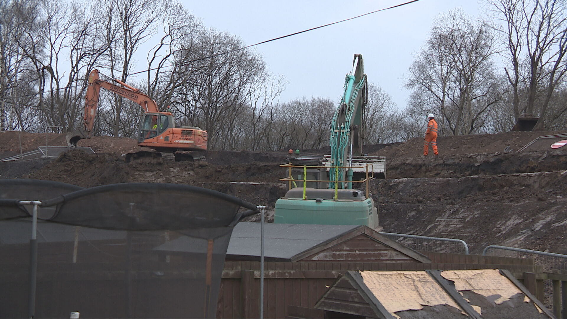 The fire broke out at a site behind a number of homes
