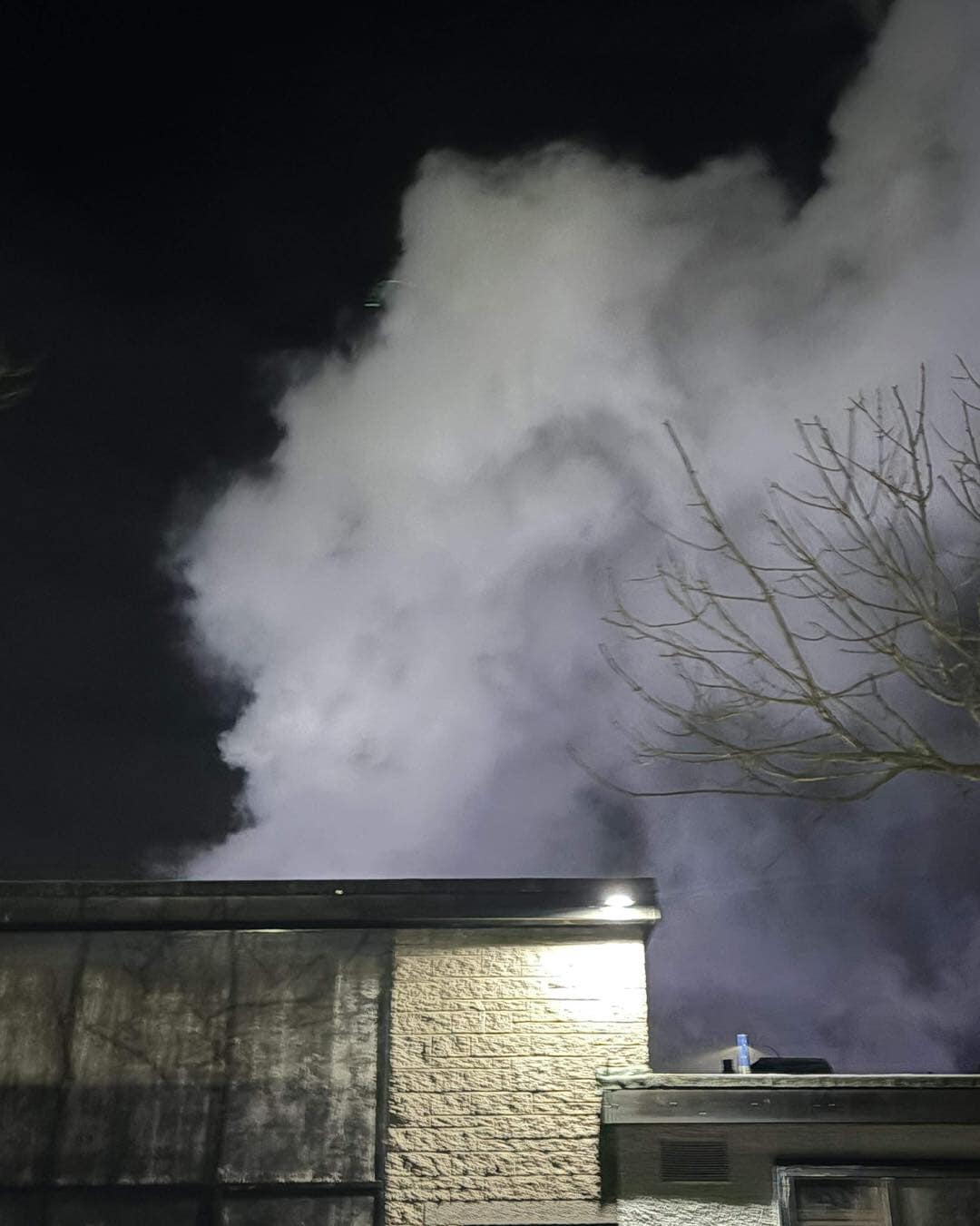 Smoke was seen billowing from the roof.