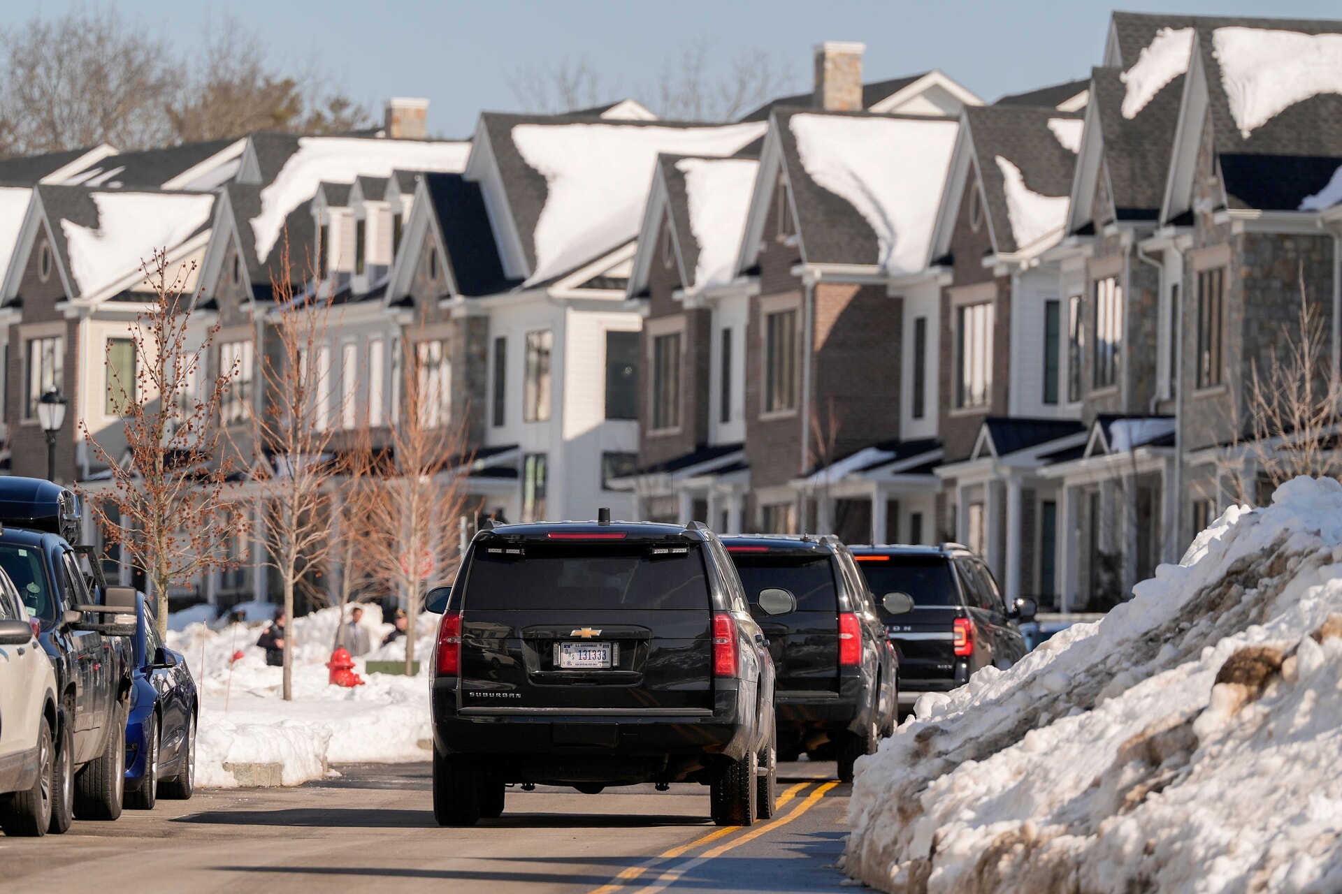 A motorcade carrying former US secretary of state Hillary Clinton arrives at the Chappaqua Performing Arts Centre