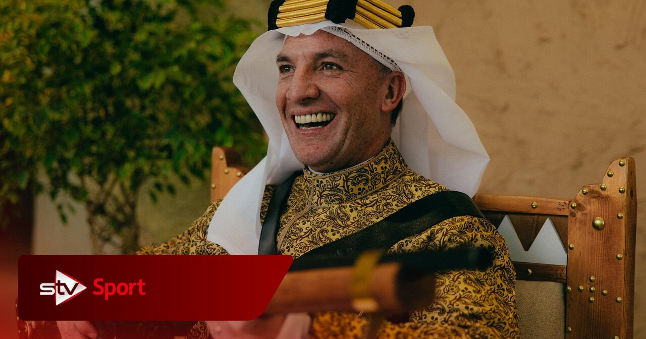 Ex Celtic manager Brendan Rodgers poses with gun wearing traditional Saudi dress 