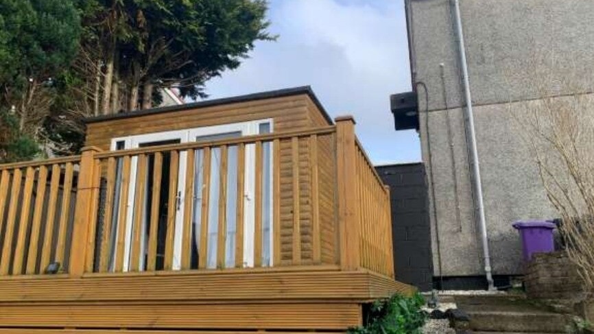 Resident wins planning battle after decking built without Glasgow council permission
