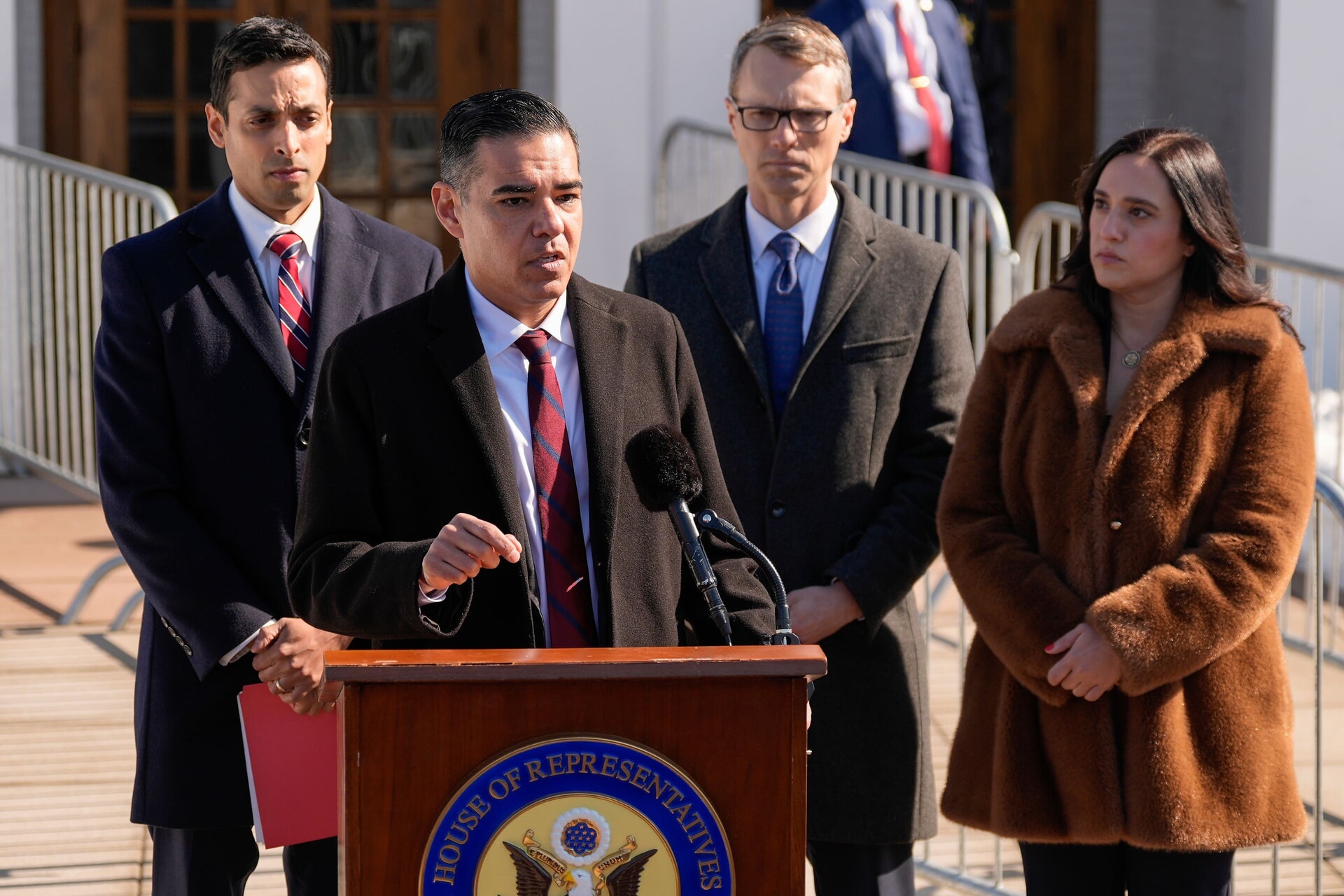 Representative Robert Garcia speaks outside the Chappaqua Performing Arts Centre before the arrival of former US secretary of state Hillary Clinton
