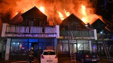 At least three dead and dozens hurt after blaze at apartments near Budapest