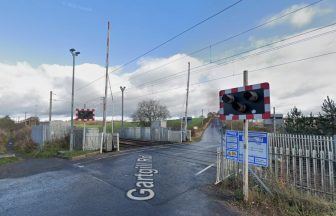 Hunt for man after boy, 12, attacked on Coatbridge dirt path near level crossing