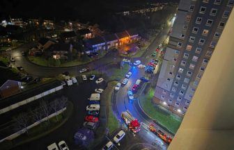 Firefighters from nine crews tackle blaze at multi-storey tower block in Motherwell