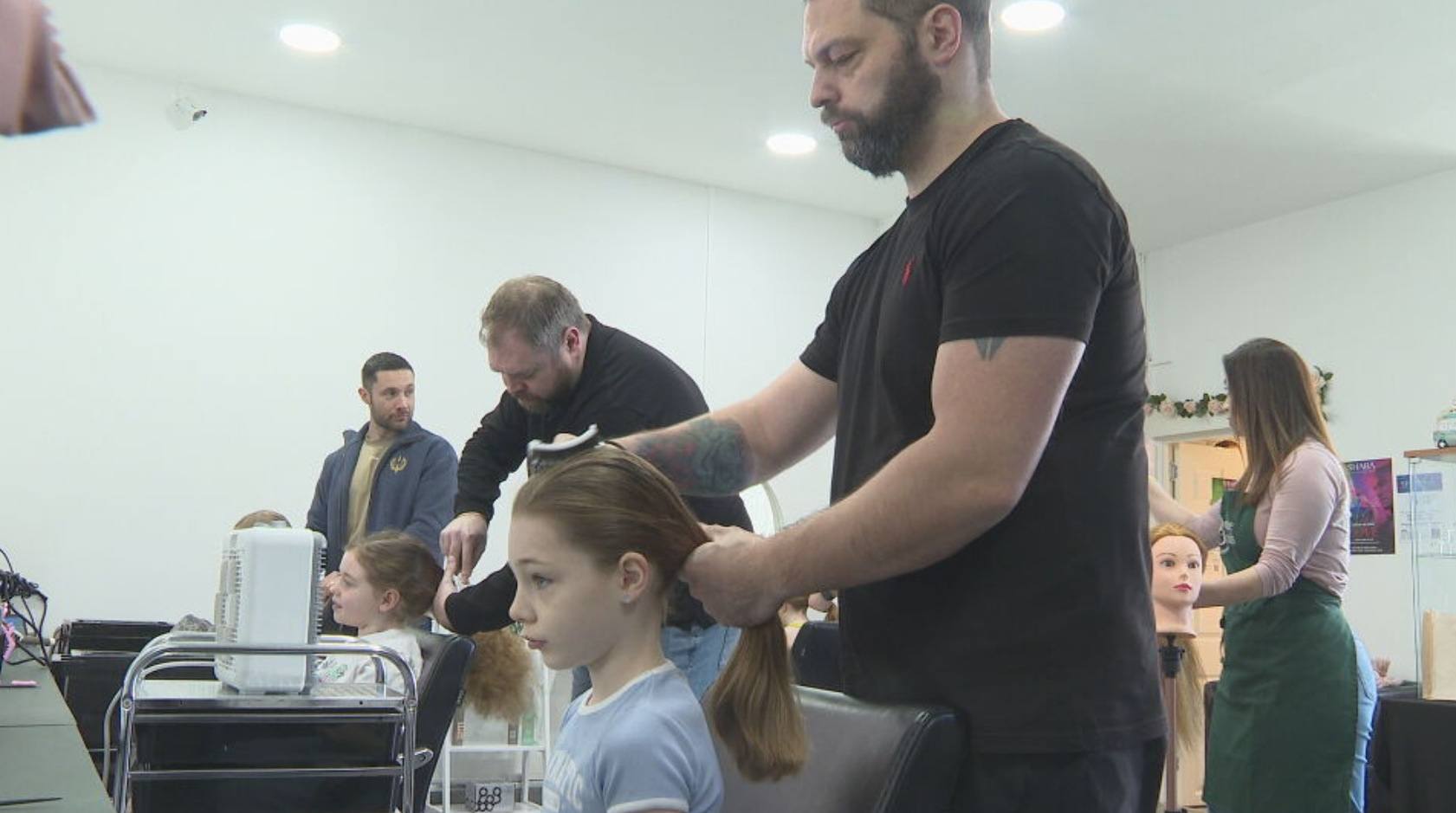 Dads learning hair basics at West Lothian workshops