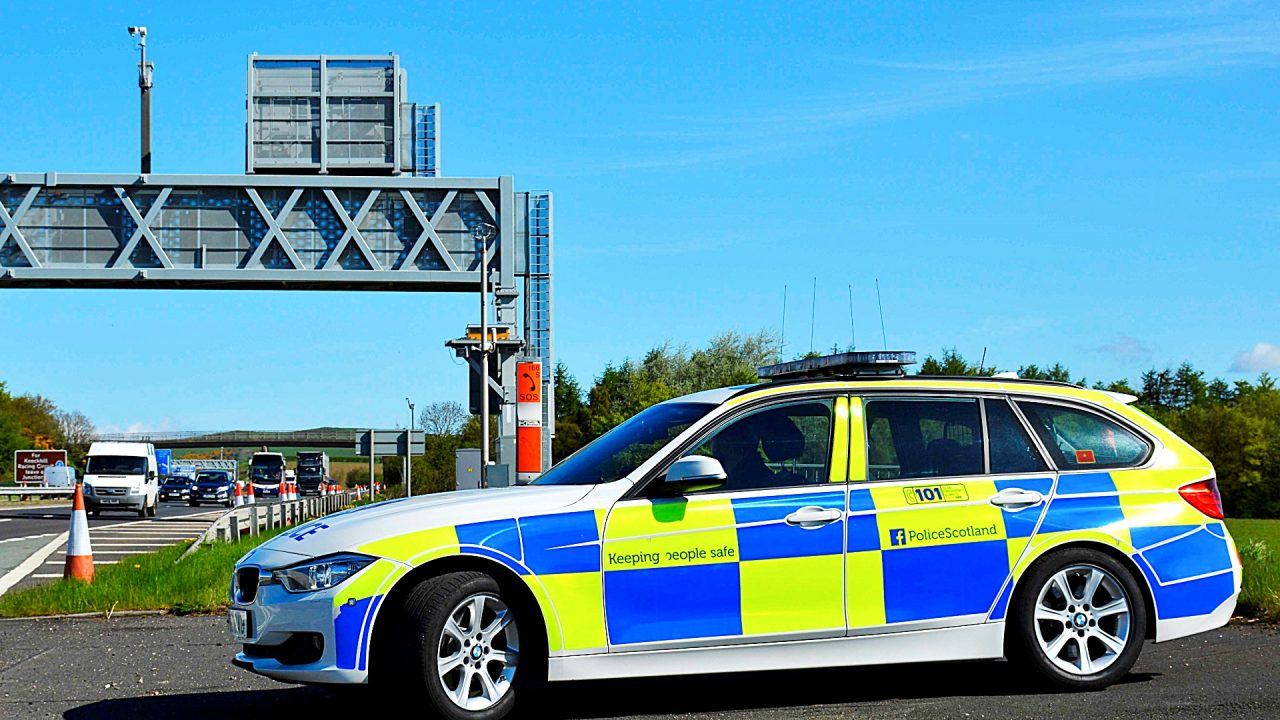 Manhunt after Ford Fiesta driver runs off after crashing with car off M8 slip road