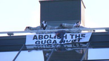 Activists stage rooftop protest over Guga hunt