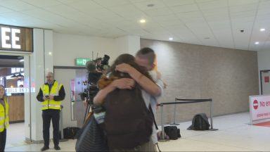 Scots trapped in Dubai return home on flight