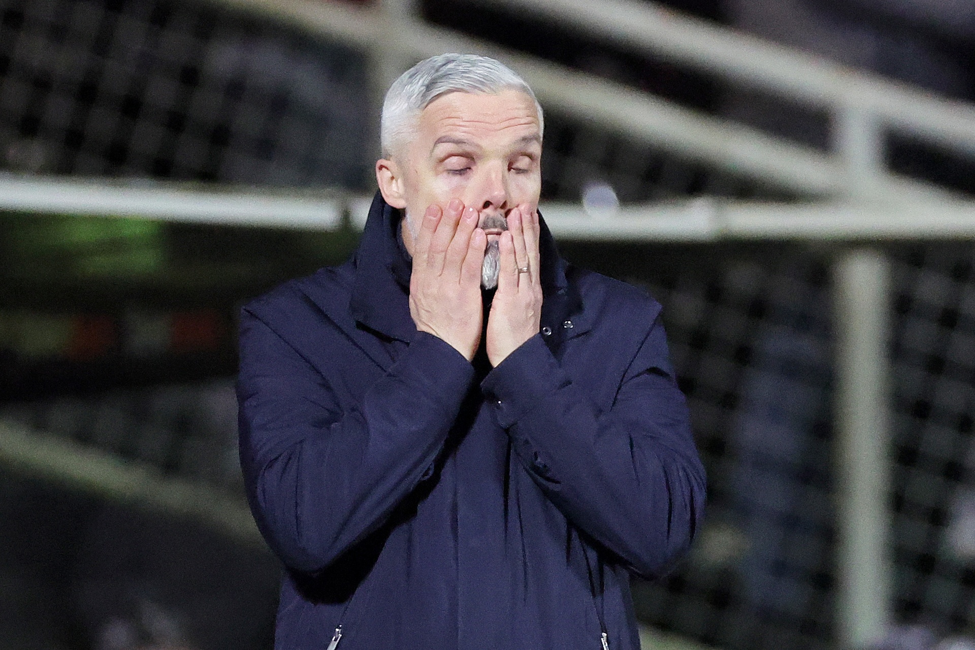 Jim Goodwin looking frustrated on the sidelines