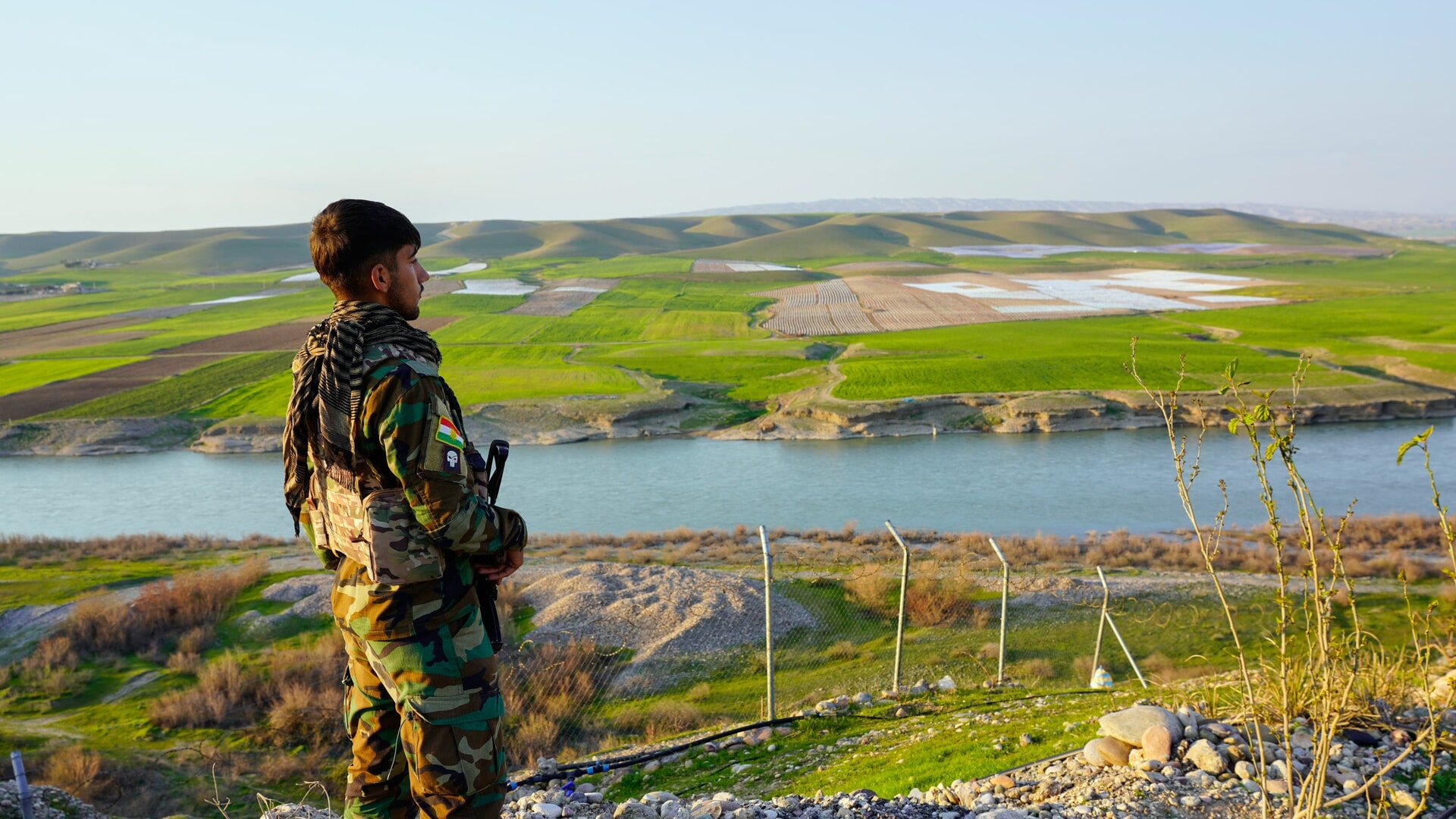 A member of the Kurdistan Freedom Party PAK, stand guard in Irbil, Iraq