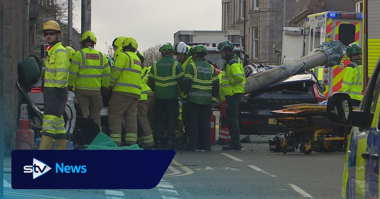 Two in hospital with serious injuries after car crushed by post ...